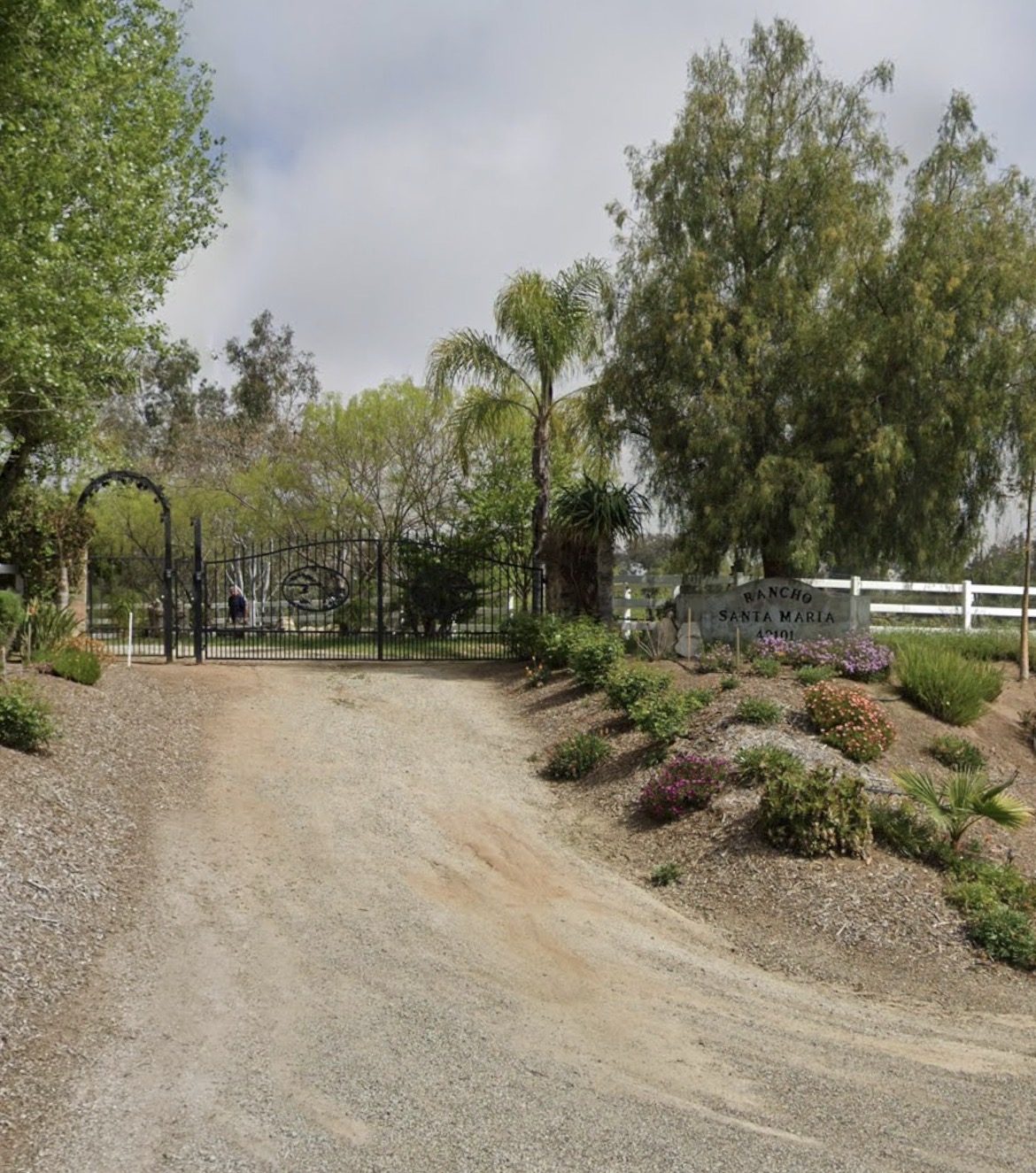 The gated entrance to Rancho Santa María at 40101 Berenda Road